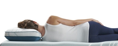 Woman on her side resting her head on a Adapt pillow